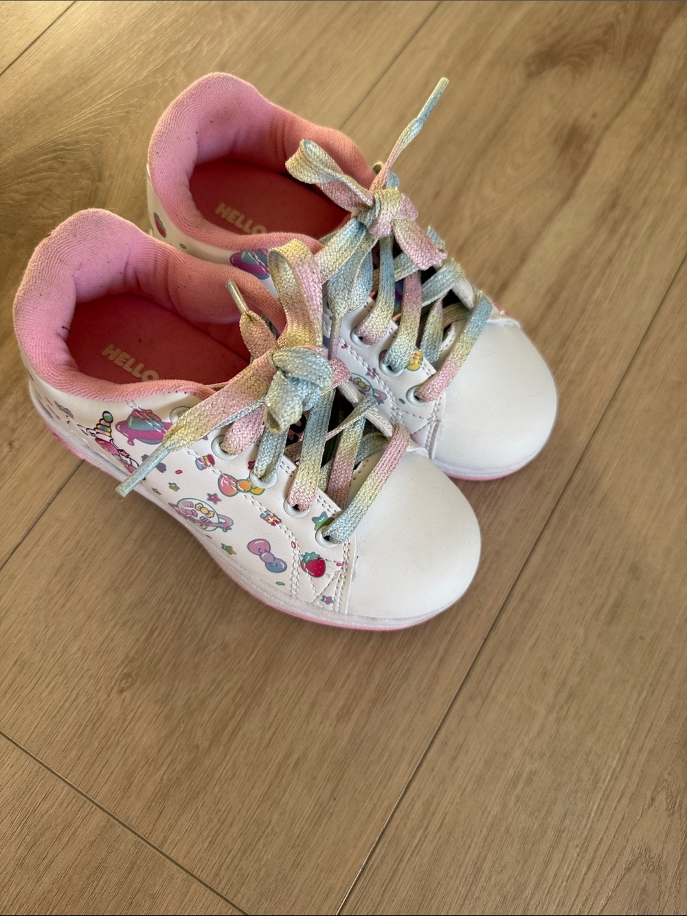 Hello Kitty White Sneakers with Pink Accents and Rainbow Laces